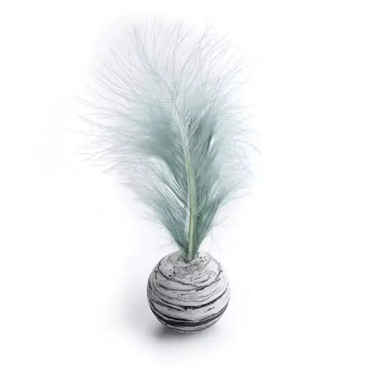TAILTRAIL cat toy feather ball with natural feathers for engaging play and exercise.