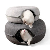 Two cats playing in TAILTRAIL Cat Donut Bed Tunnel made of premium felt material.