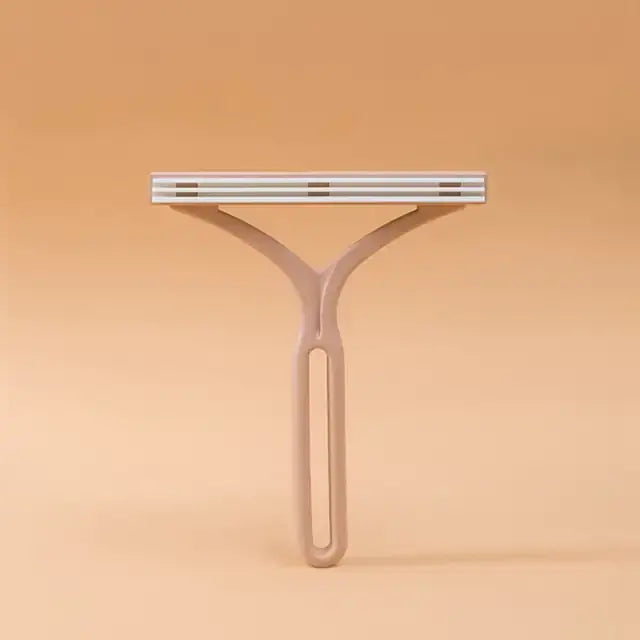 TAILTRAIL eco-friendly pet hair remover brush for effective hair and dander cleaning.