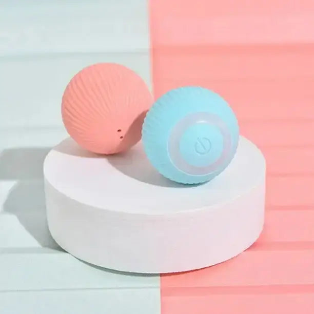 TAILTRAIL interactive rolling balls for pets on a white platform, perfect for active playtime and engagement.