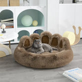 Plush cat bed by TAILTRAIL providing comfort and relaxation for cats in cozy home setting.