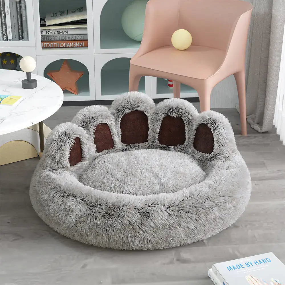 Long Plush Cat Bed by TAILTRAIL, featuring a cozy paw-shaped design and extra plush material for comfort.