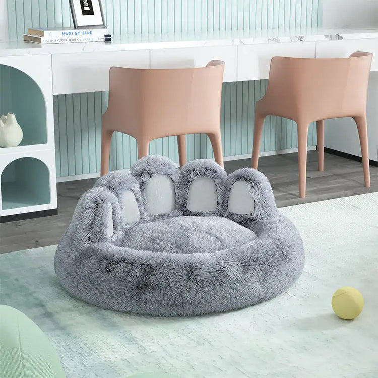 Soft gray TAILTRAIL long plush cat bed designed for optimal comfort and restful sleep, featuring a cozy paw design.