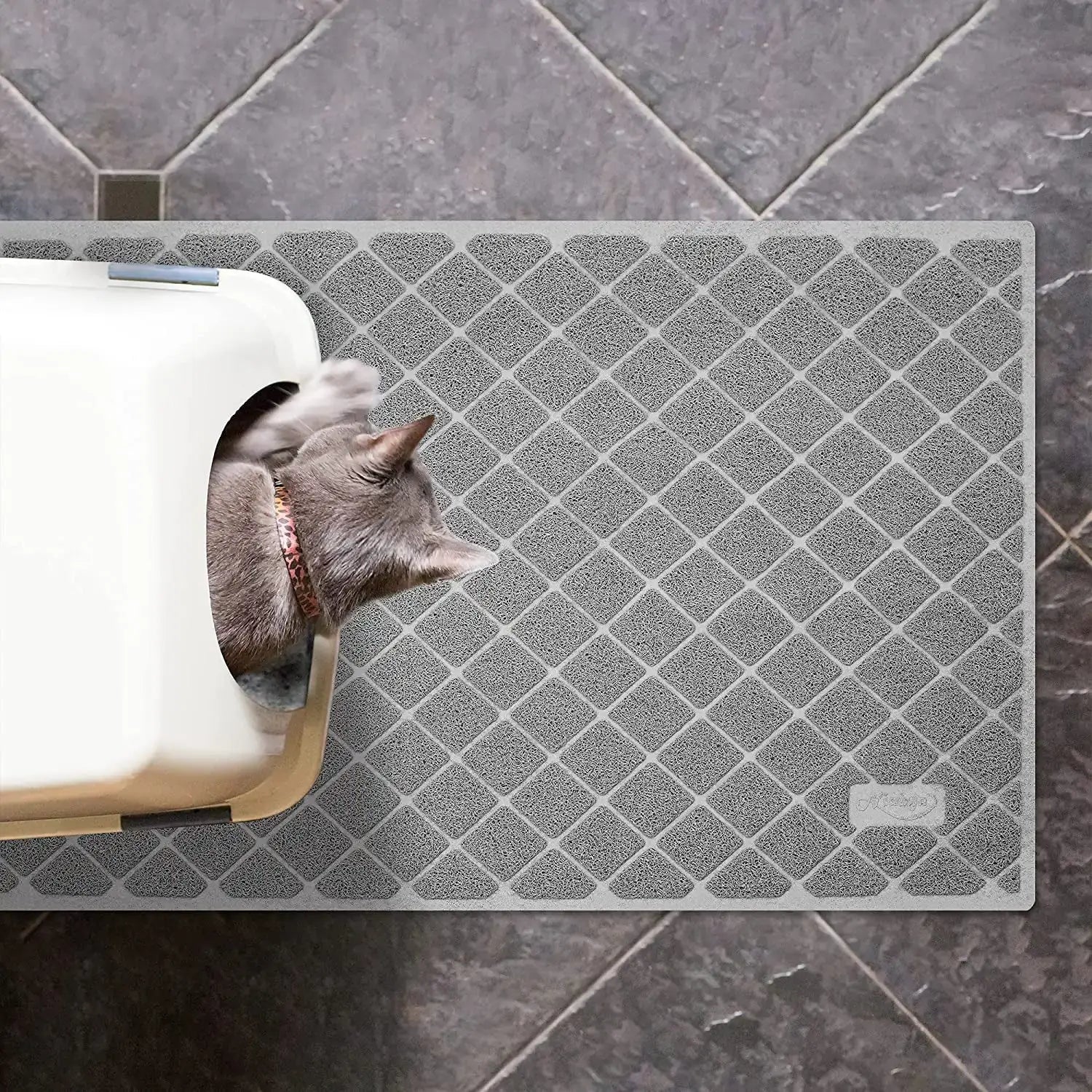 TAILTRAILTAILTRAIL non-slip cat litter mat on tile floor with cat entering litter box