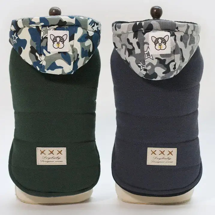 Premium dog coats by TAILTRAIL in green and navy, featuring stylish hoods for winter warmth.