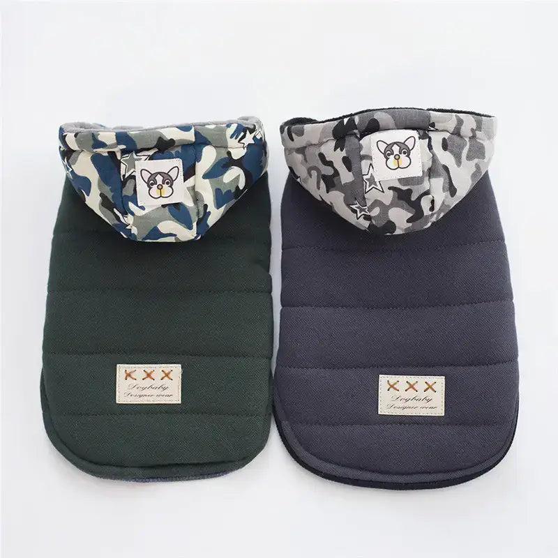Premium TAILTRAIL dog coats in camouflage and dark grey, perfect for keeping pets warm during winter.