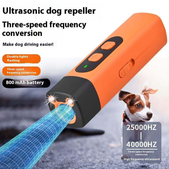 TAILTRAIL Ultrasonic dog repeller device with three-speed frequency conversion and LED flashlight for training pets.