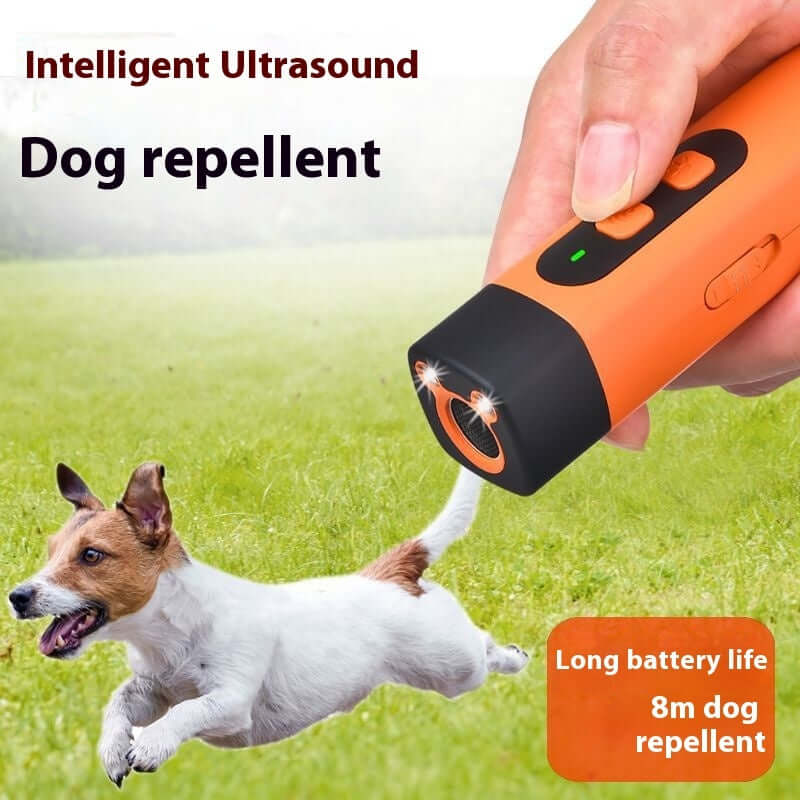 TAILTRAIL Ultrasonic dog repeller device with LED flashlight in use to deter unwanted pet behavior.
